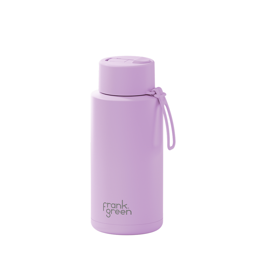 A light purple insulated water bottle with a matching lid and carrying loop, featuring the 'frank green' logo near the bottom, set against a plain white background.